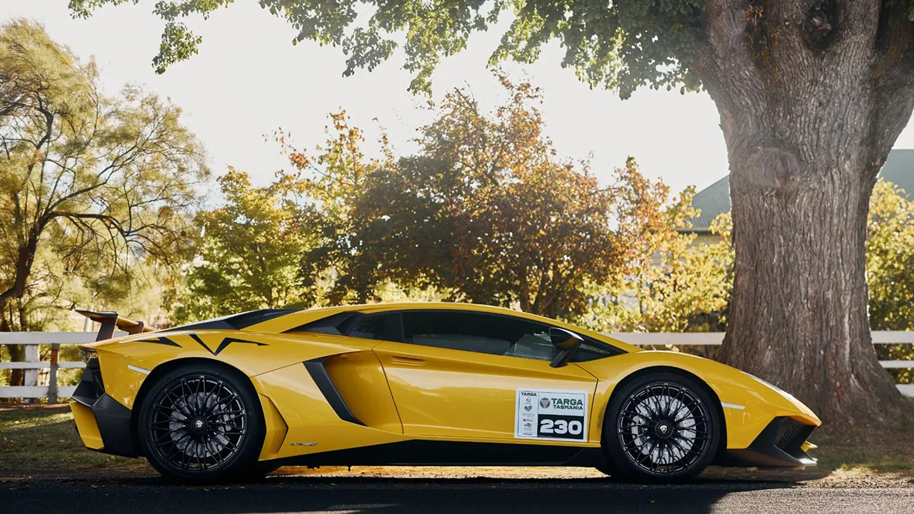 Astonishing and almighty. Aventador SV. Yellow Lamborghini Aventador SV with Targa Tasmania racing livery